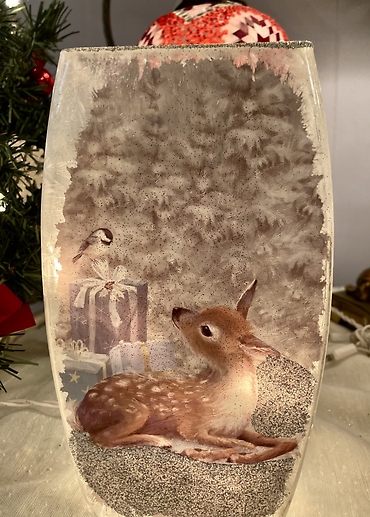 Fawn with chickaee